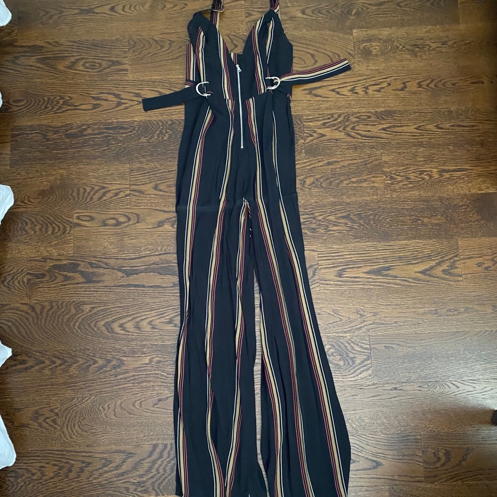 Black, red, gold and white striped jumpsuit